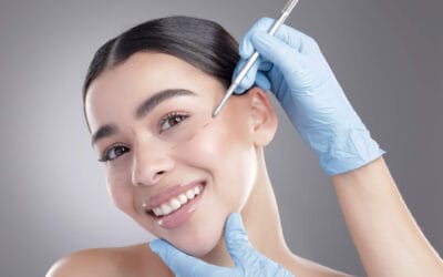 Customer being marked on her face by licensed surgeon, for a facial implants in Newport Beach, California at Dr. George Brennan's clinic